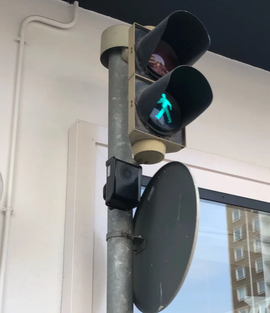 an audio beacon at a pedestrian crossing